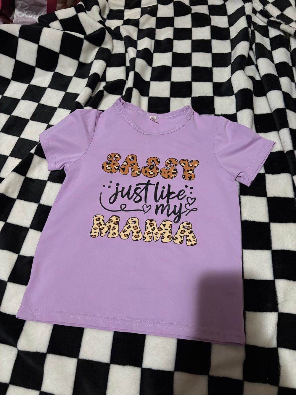 Free on bundle Size 6 sassy purple shirt (small stain)